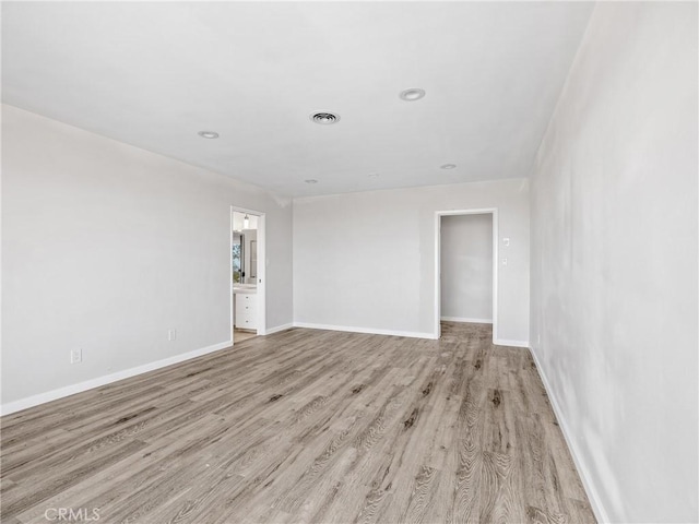 31611 157th St E, Llano, CA 93544 - spare room with light wood-type flooring, baseboards, and recessed lighting