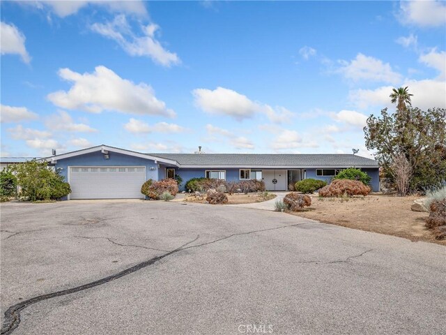 31611 157th St E, Llano, CA 93544 - single story home featuring asphalt driveway and a garage