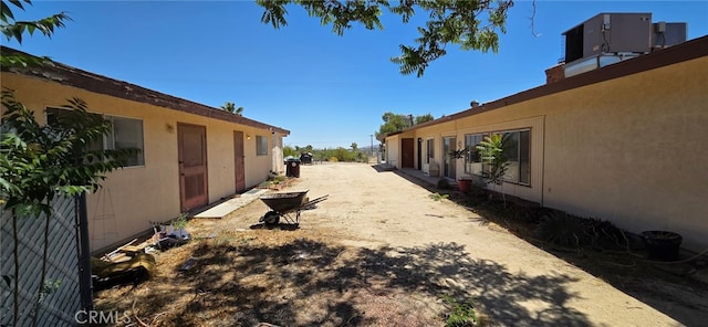 56994 Crestview Dr, Yucca Valley, CA 92284 - view of yard featuring central air condition unit