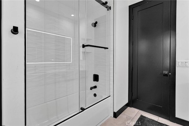 14258 Crow Rd, Apple Valley, CA 92307 - bathroom with bath / shower combo with glass door and tile patterned floors
