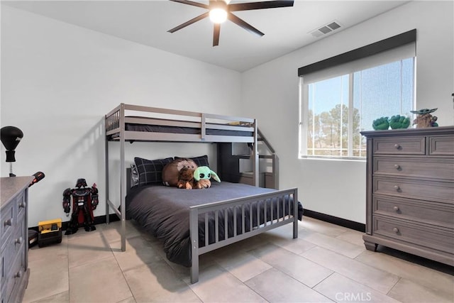 14258 Crow Rd, Apple Valley, CA 92307 - bedroom featuring light tile patterned floors, baseboards, and a ceiling fan