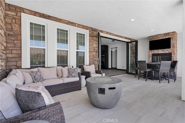 14258 Crow Rd, Apple Valley, CA 92307 - view of patio / terrace featuring an outdoor living space with a fireplace and outdoor dining area