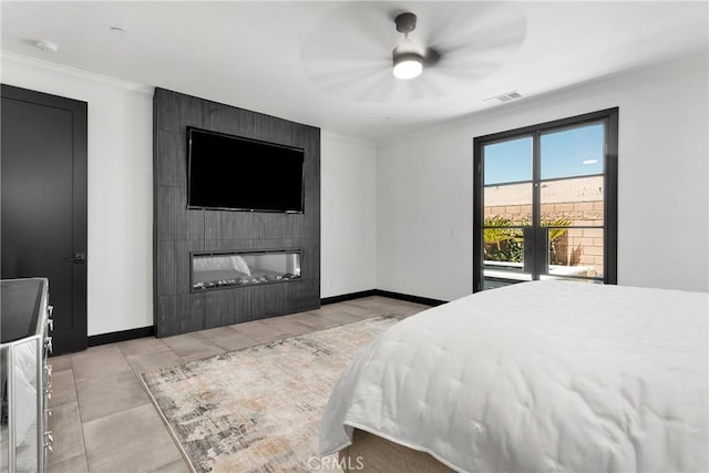 14258 Crow Rd, Apple Valley, CA 92307 - bedroom with baseboards, a fireplace, crown molding, and a ceiling fan