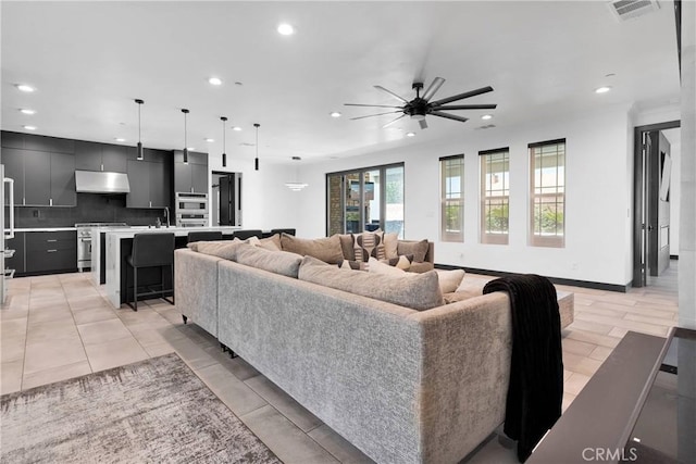 14258 Crow Rd, Apple Valley, CA 92307 - living area featuring recessed lighting, ceiling fan, and light tile patterned floors
