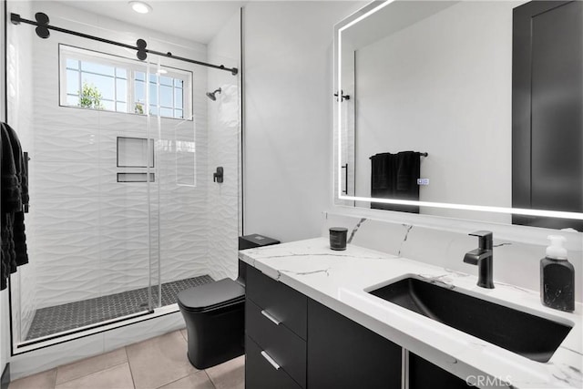 14258 Crow Rd, Apple Valley, CA 92307 - full bath featuring toilet, vanity, a shower stall, and tile patterned floors