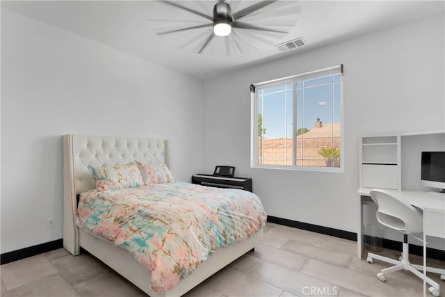 14258 Crow Rd, Apple Valley, CA 92307 - bedroom with baseboards, a desk, and a ceiling fan