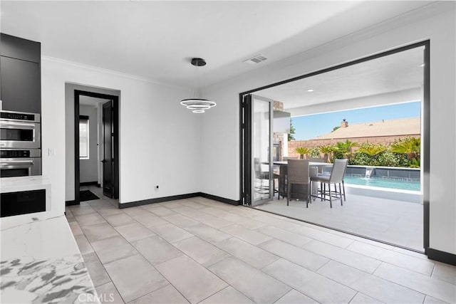 14258 Crow Rd, Apple Valley, CA 92307 - dining space featuring crown molding and baseboards