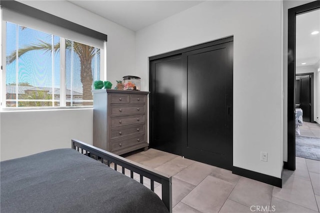 14258 Crow Rd, Apple Valley, CA 92307 - bedroom with light tile patterned flooring, a closet, and recessed lighting
