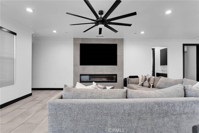 14258 Crow Rd, Apple Valley, CA 92307 - living area featuring crown molding, recessed lighting, a ceiling fan, a fireplace, and baseboards