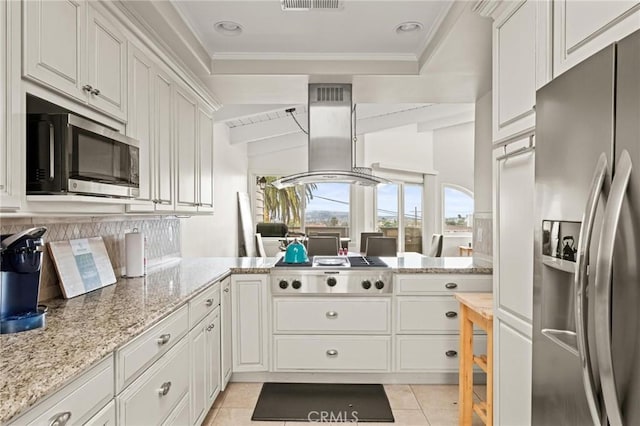 1126 W 13th St Unit 1, San Pedro, CA 90731 - kitchen with appliances with stainless steel finishes, island range hood, white cabinetry, light stone counters, and light tile patterned flooring