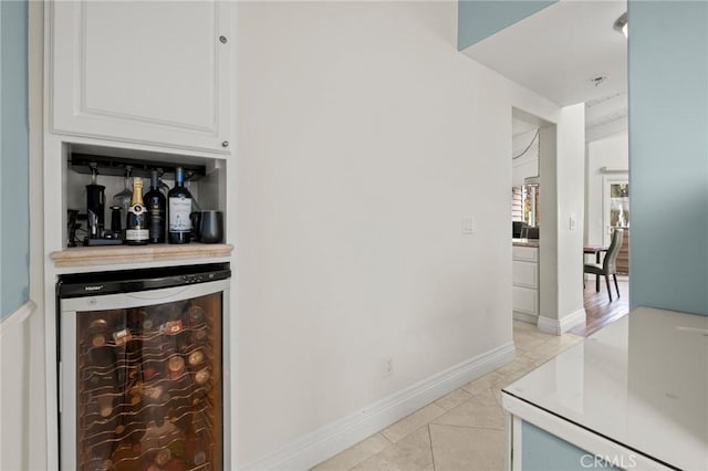 1126 W 13th St Unit 1, San Pedro, CA 90731 - bar area with wine cooler, baseboards, and light tile patterned flooring