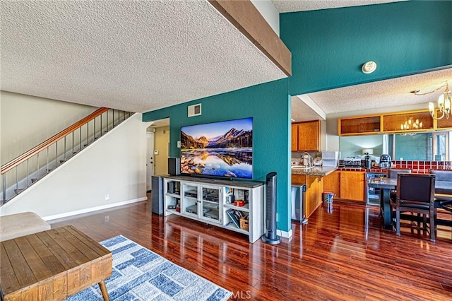 1130 Whitewater Dr Unit 263, Fullerton, CA 92833 - living area featuring a textured ceiling, stairway, wood finished floors, a chandelier, and wine cooler