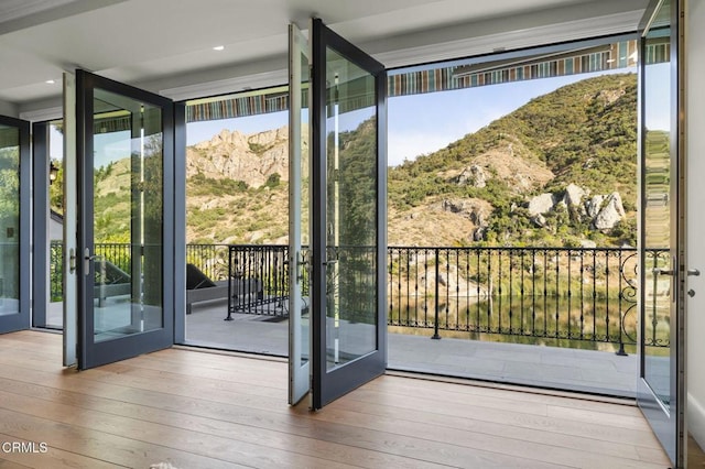 2112 Trentham Rd, Triunfo Pass-Point Mugu, CA 91361 - entryway with a mountain view, wood-type flooring, french doors, and a wall of windows