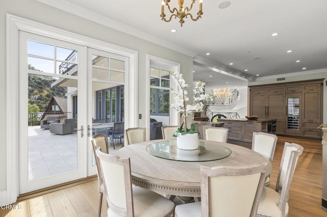2112 Trentham Rd, Triunfo Pass-Point Mugu, CA 91361 - dining space with crown molding, light wood-type flooring, a chandelier, and recessed lighting