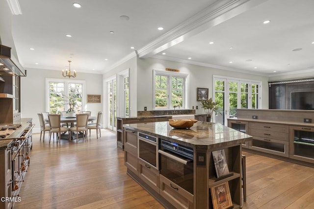 2112 Trentham Rd, Triunfo Pass-Point Mugu, CA 91361 - kitchen with open shelves, recessed lighting, light wood-style flooring, a chandelier, and light stone countertops