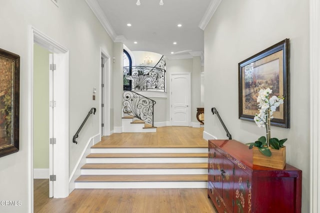2112 Trentham Rd, Triunfo Pass-Point Mugu, CA 91361 - stairway with crown molding, wood finished floors, and recessed lighting