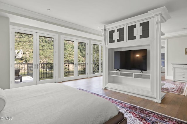 2112 Trentham Rd, Triunfo Pass-Point Mugu, CA 91361 - bedroom featuring multiple windows, crown molding, access to outside, and wood-type flooring