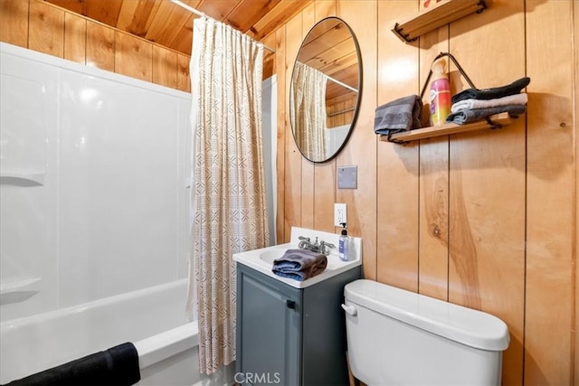 317 Moreno Ln, Sugarloaf, CA 92386 - full bathroom featuring wooden walls, shower / tub combo with curtain, toilet, wooden ceiling, and vanity