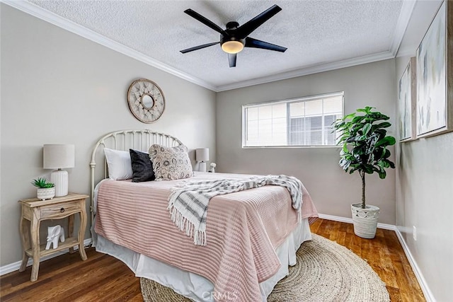 312 N Prospect Ave, Redondo Beach, CA 90277 - bedroom featuring a textured ceiling, wood finished floors, baseboards, a ceiling fan, and ornamental molding