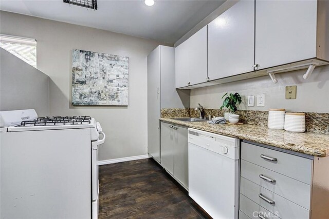 312 N Prospect Ave, Redondo Beach, CA 90277 - kitchen with white appliances, baseboards, dark wood-style floors, a sink, and white cabinetry