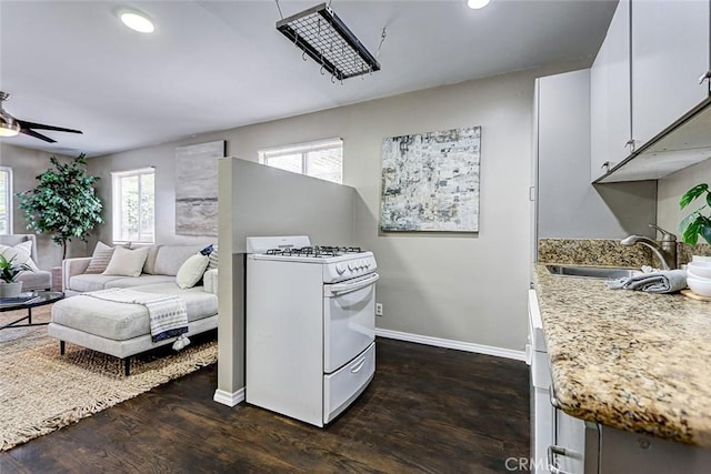 312 N Prospect Ave, Redondo Beach, CA 90277 - kitchen featuring gas range gas stove, a sink, healthy amount of natural light, dark wood-type flooring, and recessed lighting