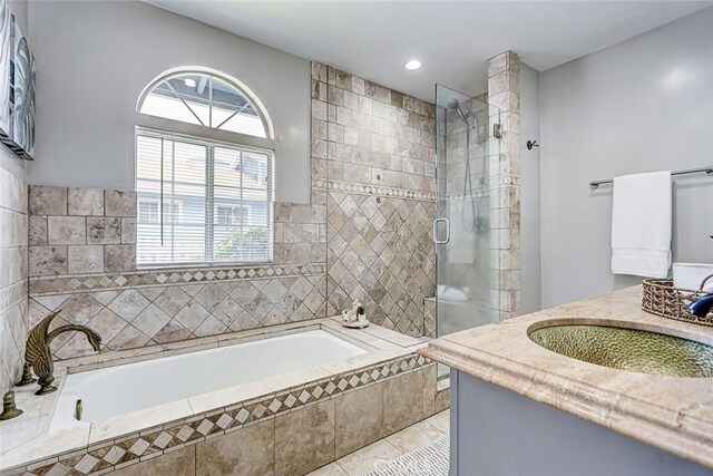 312 N Prospect Ave, Redondo Beach, CA 90277 - full bathroom featuring a shower stall, a garden tub, healthy amount of natural light, vanity, and recessed lighting