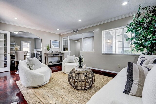312 N Prospect Ave, Redondo Beach, CA 90277 - living area with wood finished floors, baseboards, recessed lighting, arched walkways, and a textured ceiling
