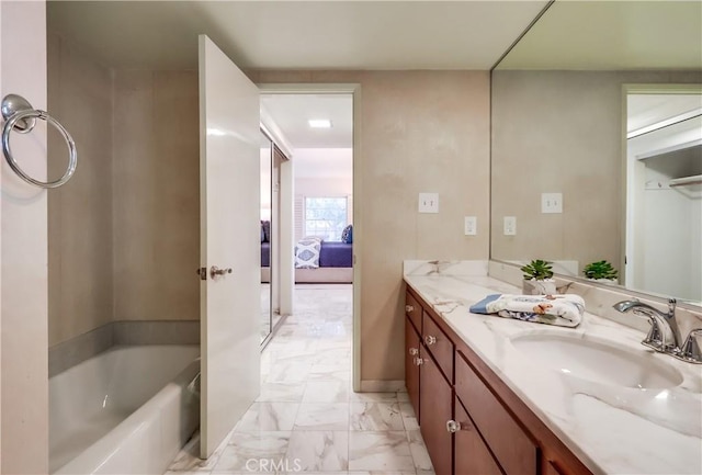 6604 Via Siena, Rancho Palos Verdes, CA 90275 - ensuite bathroom with a tub to relax in, vanity, and marble look tiles
