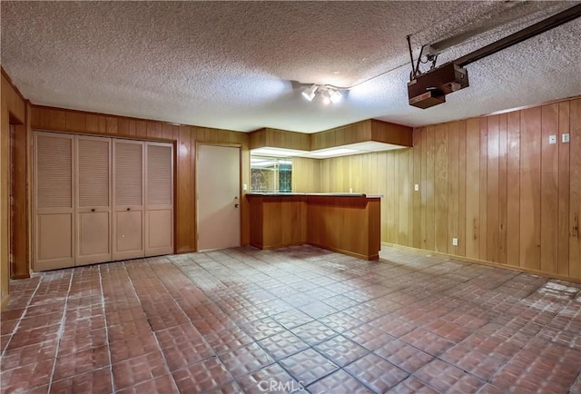 6604 Via Siena, Rancho Palos Verdes, CA 90275 - indoor bar with wooden walls and a textured ceiling