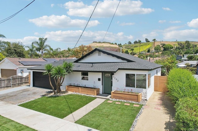 3243 Carolyn Cir, Oceanside, CA 92054 - view of front of home with a shingled roof, driveway, a garage, stucco siding, and stone siding