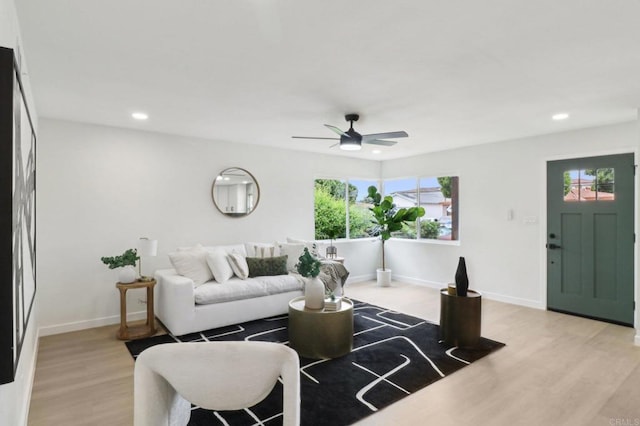 3243 Carolyn Cir, Oceanside, CA 92054 - living room with light wood finished floors, ceiling fan, recessed lighting, and baseboards