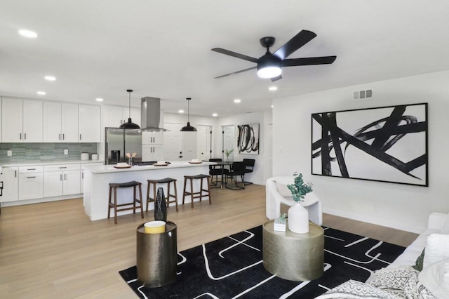 3243 Carolyn Cir, Oceanside, CA 92054 - living area with light wood-type flooring, recessed lighting, ceiling fan, and baseboards