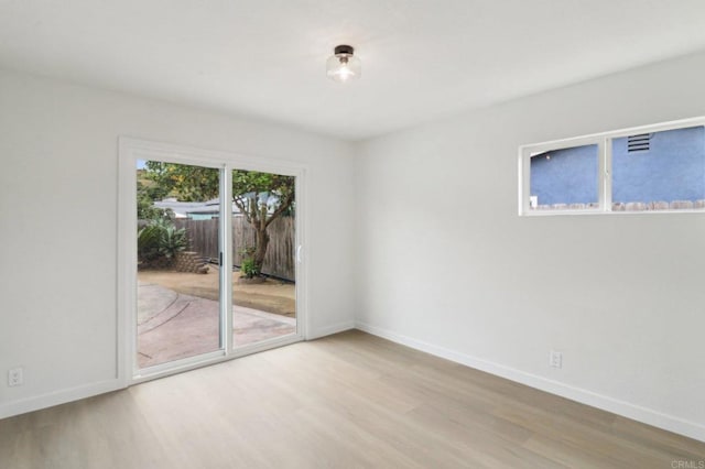 3243 Carolyn Cir, Oceanside, CA 92054 - spare room with light wood-style floors and baseboards