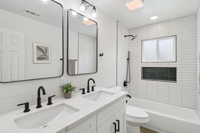 3243 Carolyn Cir, Oceanside, CA 92054 - full bathroom featuring double vanity, shower / tub combination, and toilet