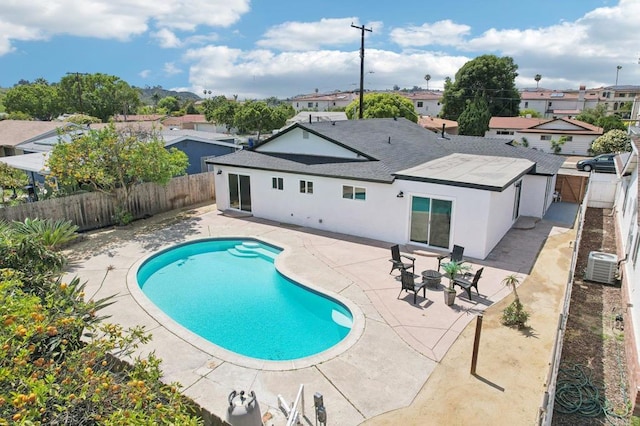 3243 Carolyn Cir, Oceanside, CA 92054 - view of pool featuring cooling unit, a fenced backyard, a patio area, and a residential view