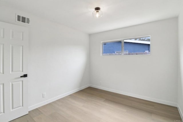 3243 Carolyn Cir, Oceanside, CA 92054 - unfurnished room with light wood-style floors and baseboards