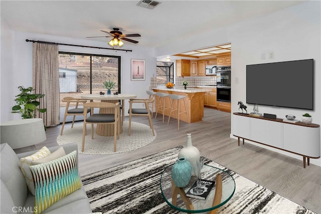31346 Indian Oaks Rd, Acton, CA 93510 - living area featuring light wood-style flooring and a ceiling fan