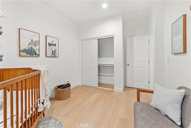 436 E Truslow Ave, Fullerton, CA 92832 - bedroom featuring wood finished floors, a closet, baseboards, a nursery area, and recessed lighting