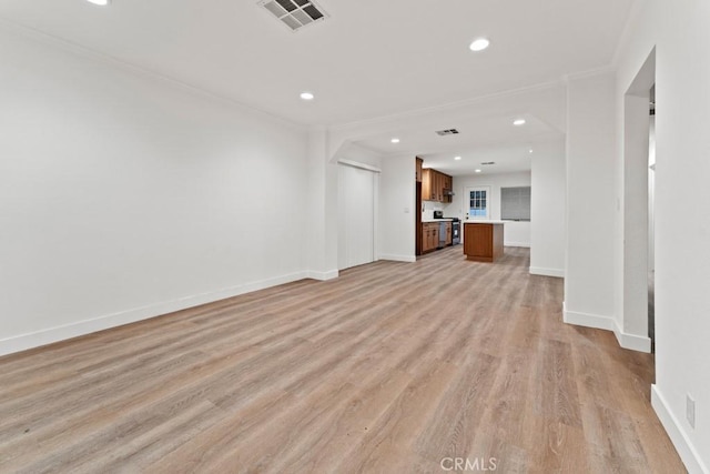 436 E Truslow Ave, Fullerton, CA 92832 - unfurnished living room with light wood-type flooring, recessed lighting, ornamental molding, and baseboards