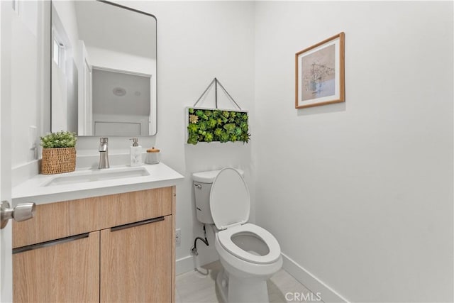 436 E Truslow Ave, Fullerton, CA 92832 - half bathroom with toilet, vanity, and baseboards