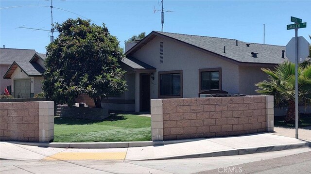 206 S Oak Glen Ave, Nipomo, CA 93444 - view of front of house with a shingled roof and stucco siding
