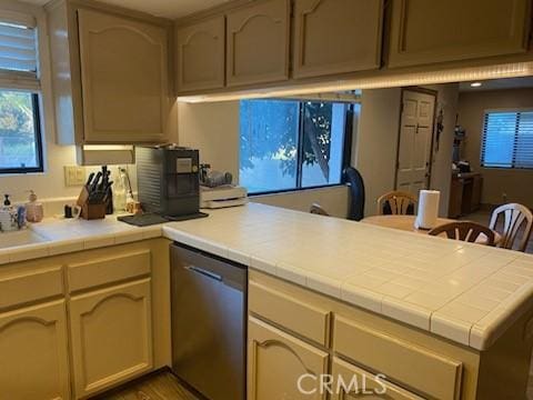 206 S Oak Glen Ave, Nipomo, CA 93444 - kitchen featuring dishwasher, a peninsula, and tile countertops