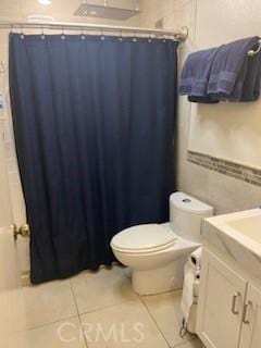 206 S Oak Glen Ave, Nipomo, CA 93444 - full bathroom featuring vanity, tile patterned flooring, toilet, and curtained shower