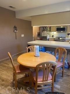 206 S Oak Glen Ave, Nipomo, CA 93444 - dining space featuring wood finished floors