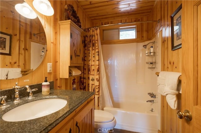 43897 Yosemite Dr, Big Bear Lake, CA 92315 - bathroom with toilet, vanity, shower / bath combo with shower curtain, wooden ceiling, and wood walls