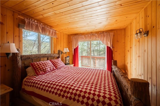 43897 Yosemite Dr, Big Bear Lake, CA 92315 - bedroom featuring multiple windows, wood walls, and wood ceiling