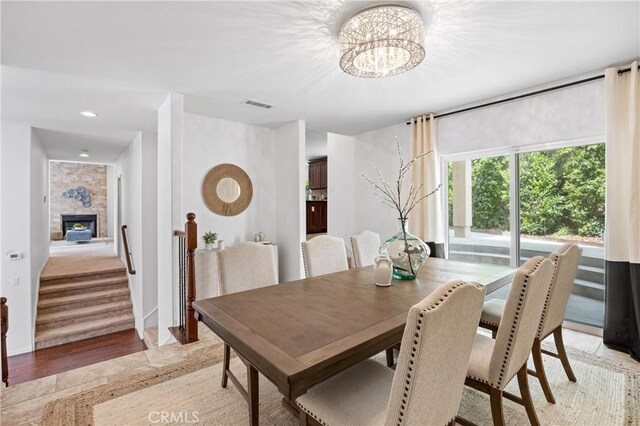 2421 N Feather Hill Dr, Orange, CA 92867 - dining room with a chandelier and stairway