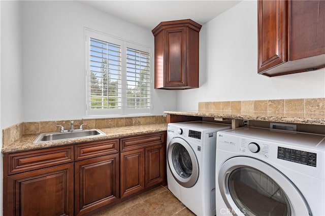 2421 N Feather Hill Dr, Orange, CA 92867 - laundry room featuring washer and dryer, cabinet space, and light tile patterned floors
