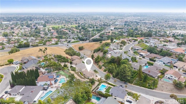 2421 N Feather Hill Dr, Orange, CA 92867 - aerial view of property and surrounding area with a pool area and nearby suburban area
