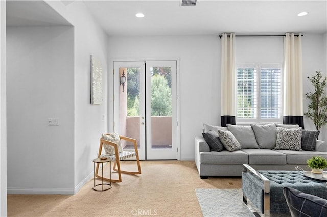 2421 N Feather Hill Dr, Orange, CA 92867 - living area featuring light carpet, baseboards, and recessed lighting